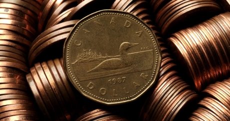 Four economists weigh in on how low the loonie will go in 2017