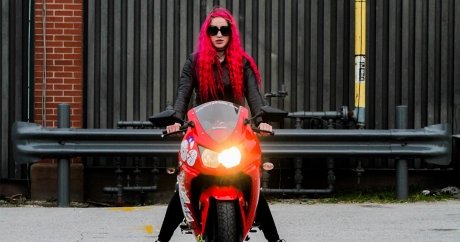 Young Money: This millennial takes odd jobs and travels North America on her motorcycle